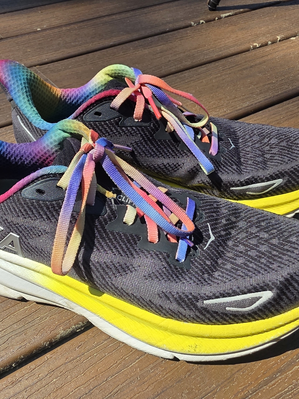 Hoka One One Clifton 9 Running Shoes with Yellow Midsole and Rainbow Details